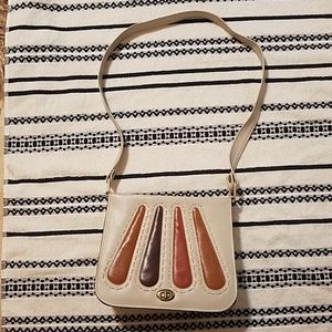 Tan purse with orange accents